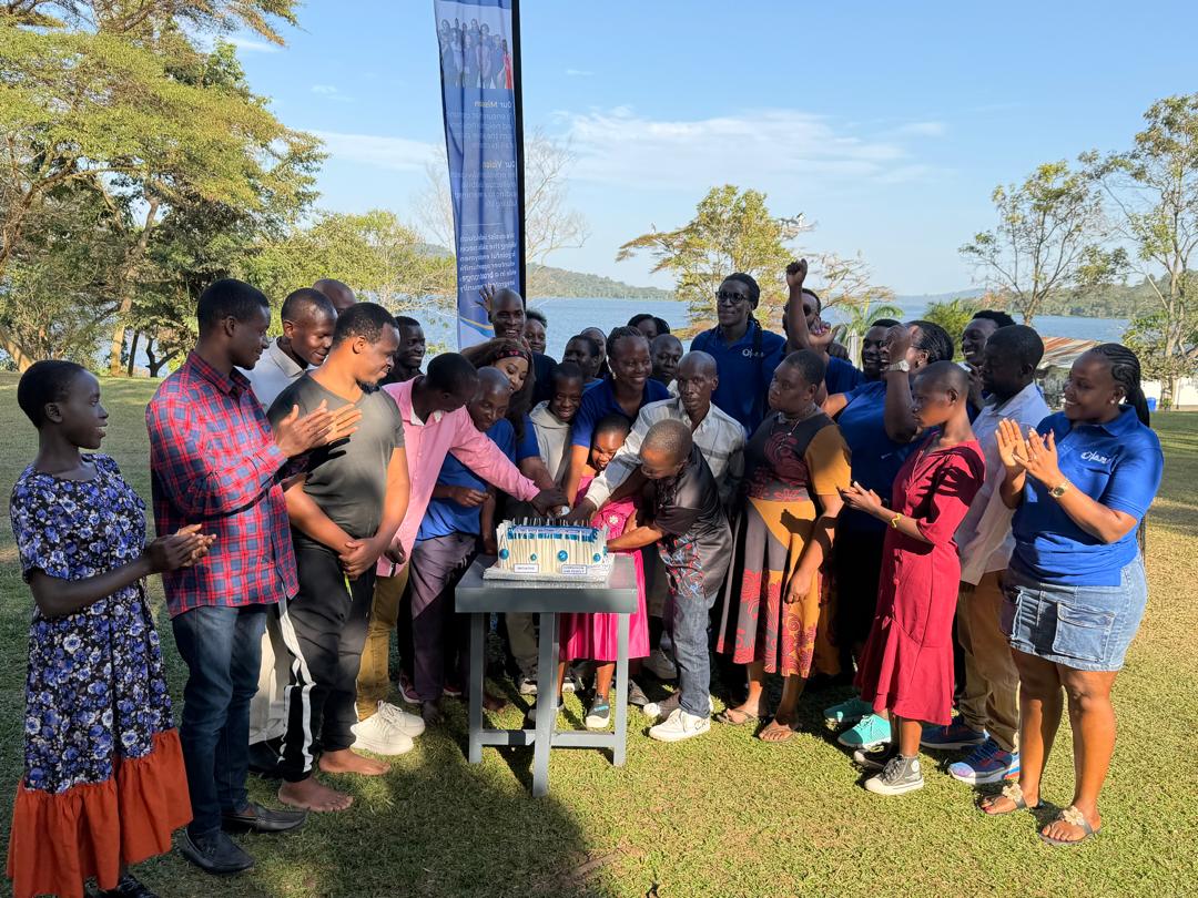 AMA Support Services team and community members gathered outdoors